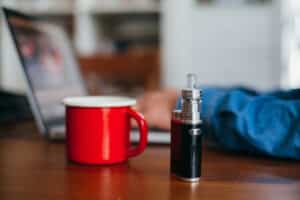How to Unclog a Vape Cart (and How to Prevent It) 4 E-Cigarette Standing on a Table